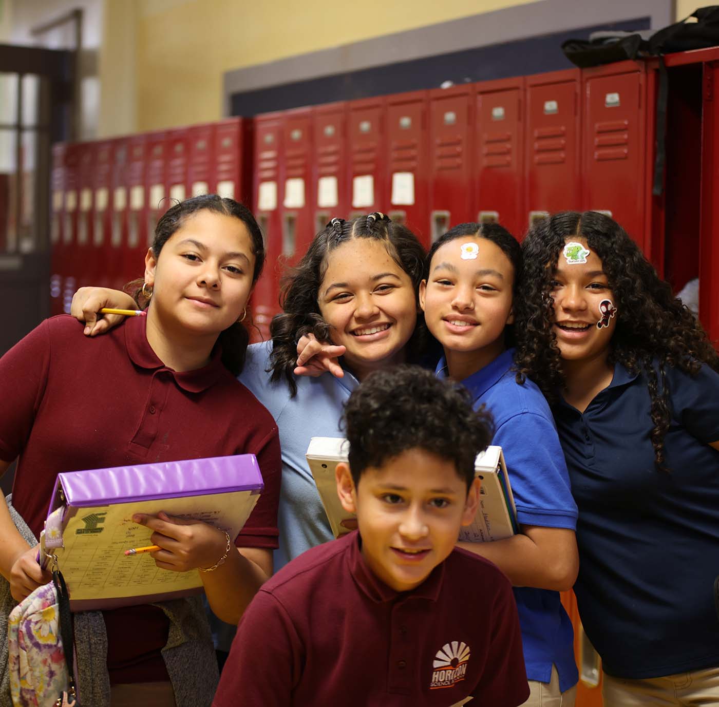 Horizon Science Academy Denison student drawing at a desk in a classroom setting